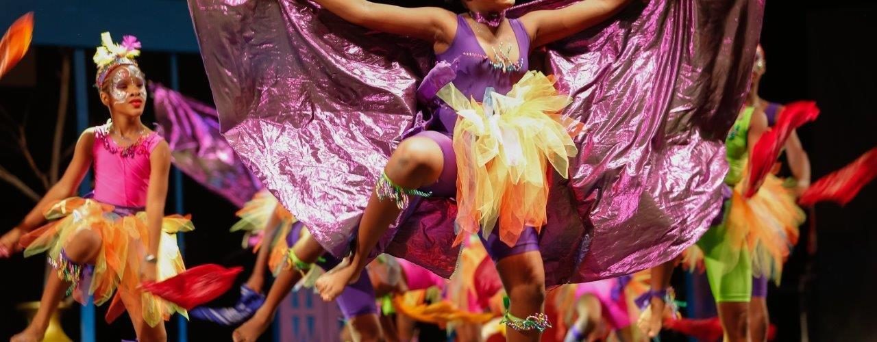 Members of the Tivoli Dance Troupe perform the dance “Soca Parade” at the National Finals of the Festival of the Performing Arts.