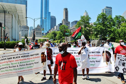 Ephraim Martin with mikeleading the Black Heroes- DuSable Rally-July 4th Chicago